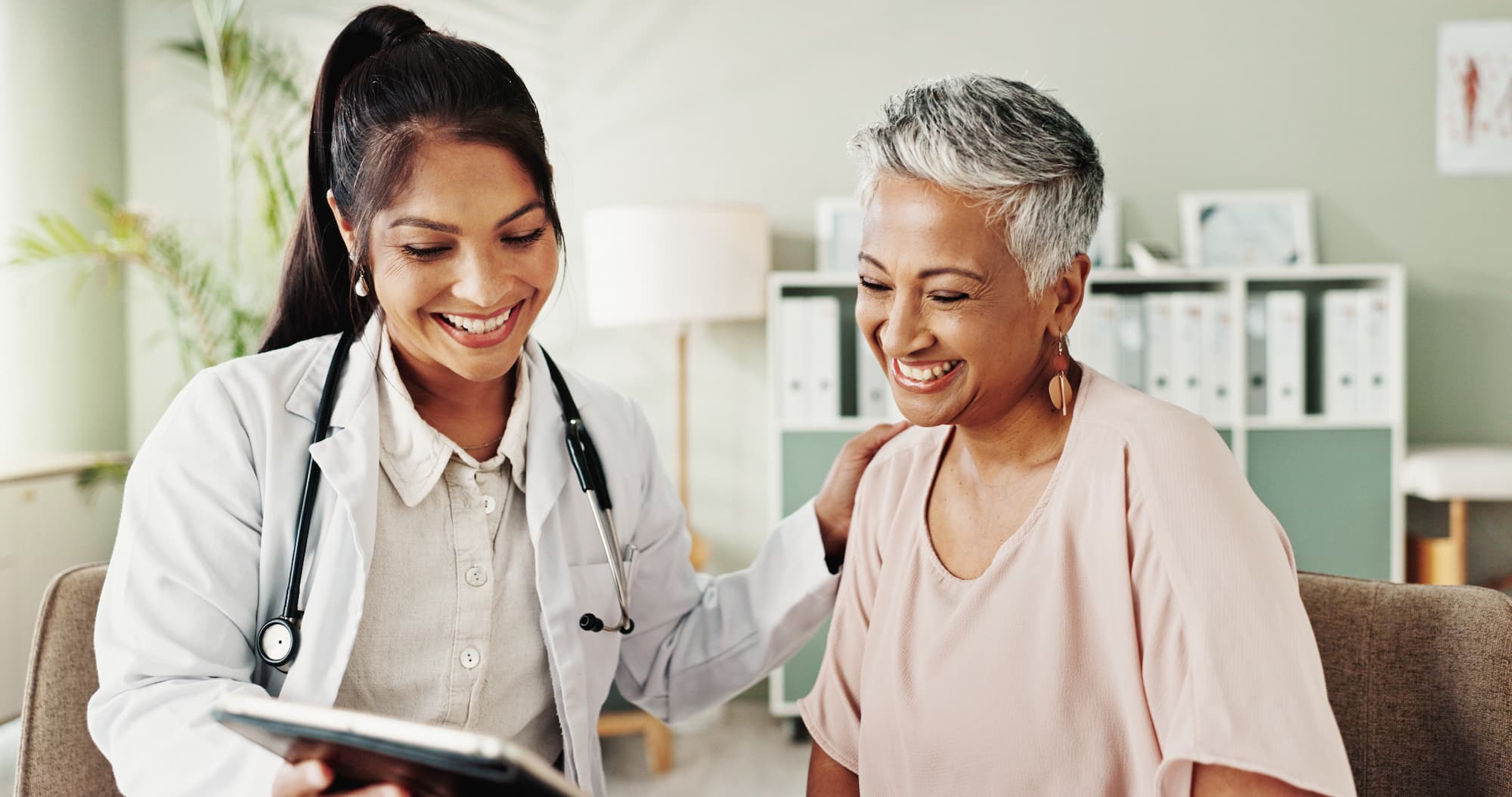Stock photo of doctor with patient.