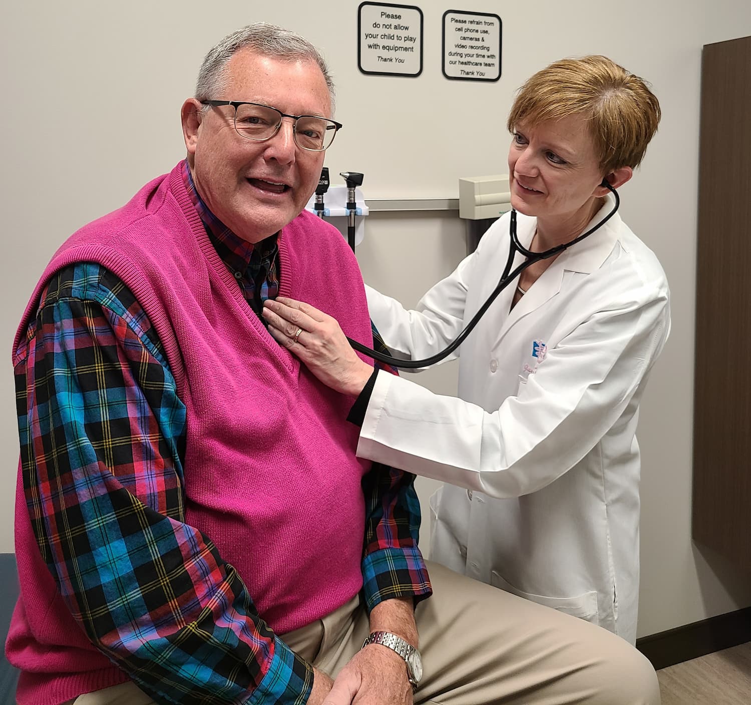 Dr. Jan Froehlich with a patient.