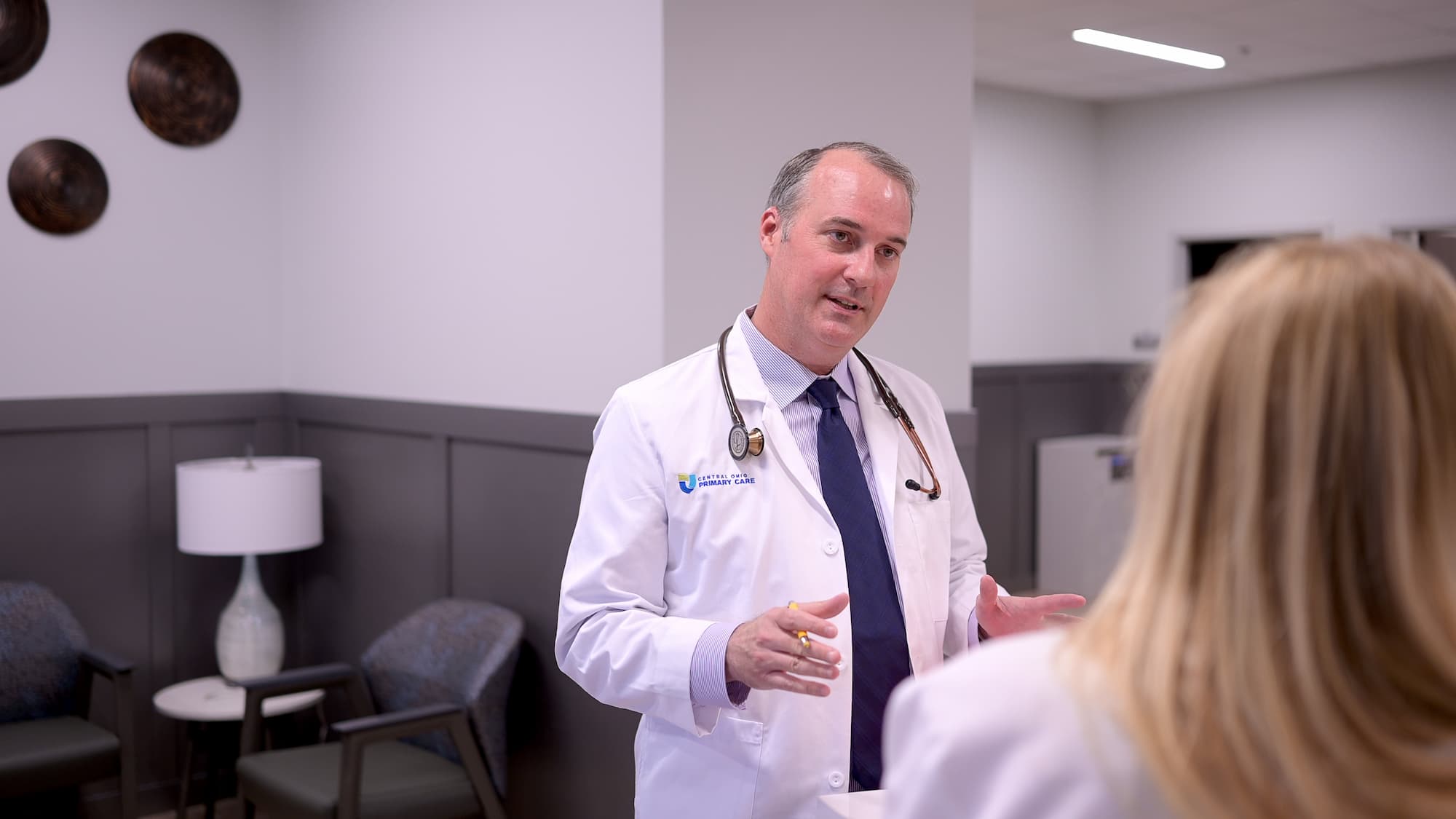 agilon health, lifestyle photo of a doctor in an office