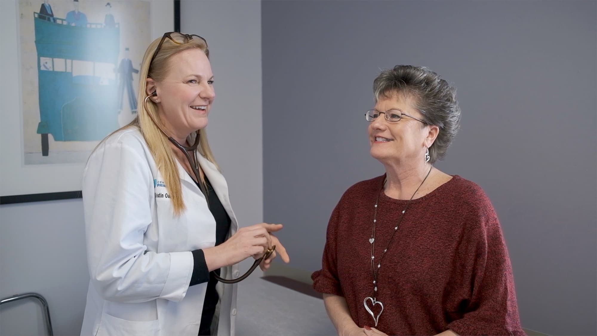 agilon health physician speaking with a patient.