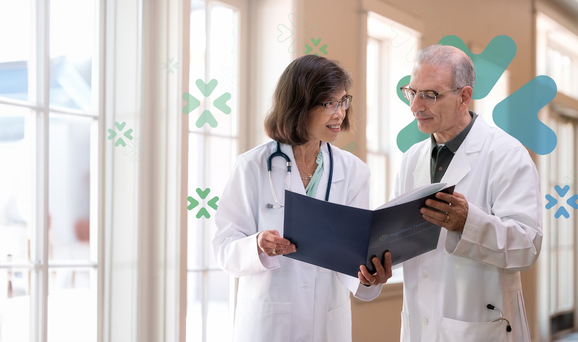 Generic stock photo of two doctors with agilon related branding on it.